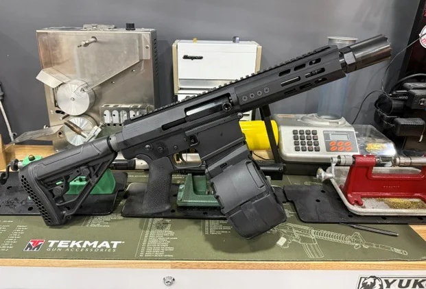 Short-barrelled Genesis Gen-12 12 gauge shotgun