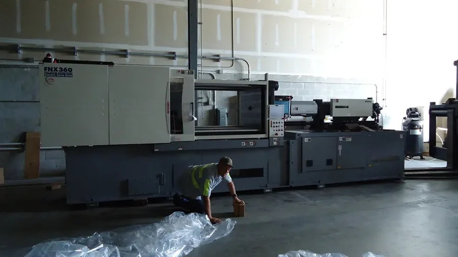 Nissei FNX360 injection molding machine on the floor at Almond Joy Plastics, Palm City, Florida